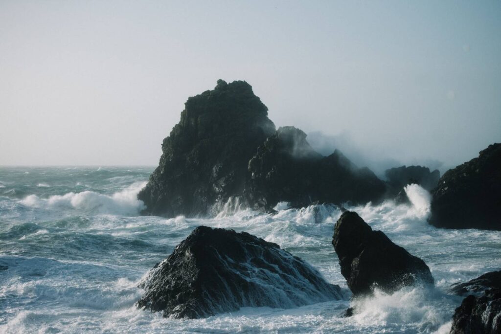 beautiful scenery sea waves crashing rock formations 1